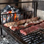 Parrilla argentina con braci e carne cruda — Workshop BBQ Fonteblanda